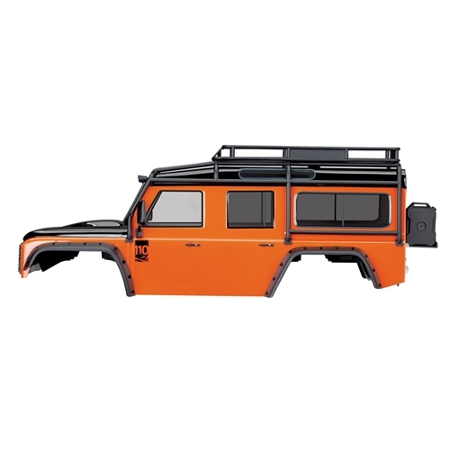 Traxxas TRX-4 Land Rover Defender Adventure con carrocería naranja con ExoCage, guardabarros interiores, depósitos de combustible y gato